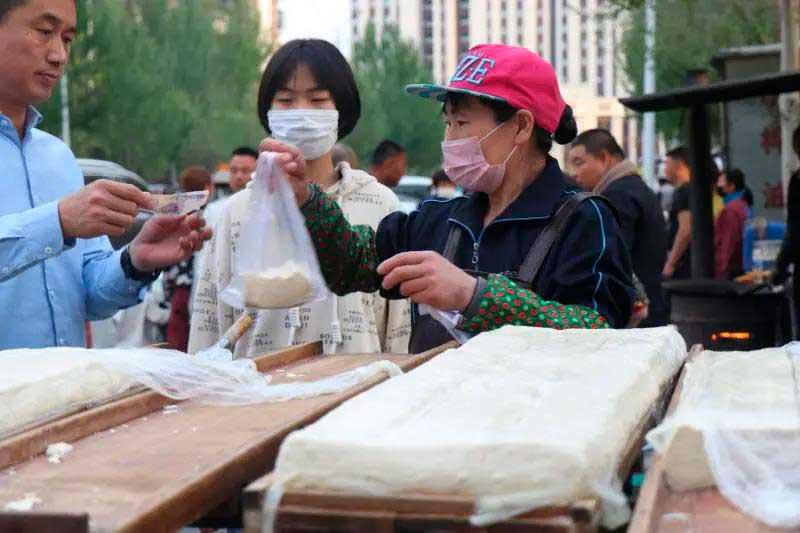 “卤水豆腐喽”